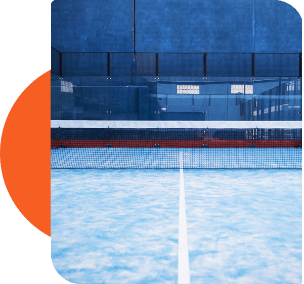 An indoor padel court featuring a pristine white line and net, all set against smooth blue flooring, perfect for residential use.